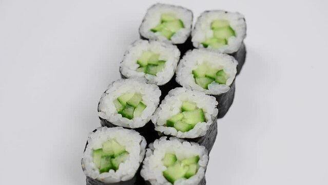 Set of kappa maki rolls spin on white background. 