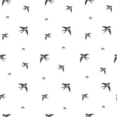 Flying swallows. Pattern seamless with vector illustrations and bird theme
