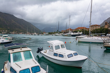 Fototapeta premium Several yachts and boats are moored at the pier in the Mediterranean Sea.