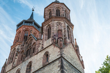 Fototapeta na wymiar Front with towers of St. John's Church in Goettingen, raised view