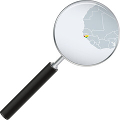 Guinea-Bissau map with flag in magnifying glass.