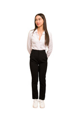 Young colombian woman standing full body cut out isolated