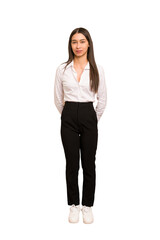 Young colombian woman standing full body cut out isolated