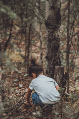 Toddler in woods