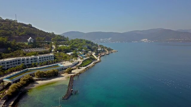 A drone shot of a hotel and the sea in Bodrum, Turkey