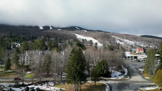 Arial View Of A Drone Moving Away From Mount Snow Mountain