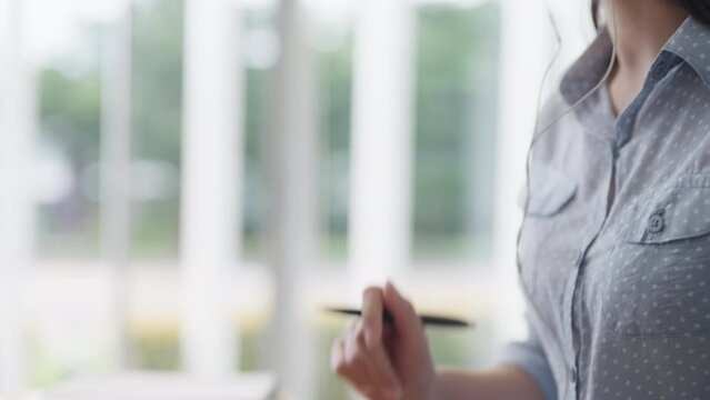 Future of workforce work hybrid anywhere workplace for Gen Z talent. Young adult asia people sit relax video call speak talk online telework or study MBA class at share office. Happy digital nomad job