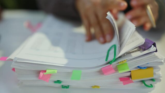 tax time. accountant woman working with documents.