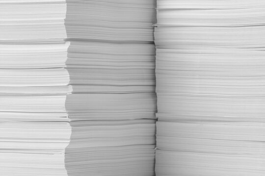 Stacks of paper sheets as background, closeup