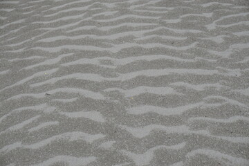 closeup of dry and wet sand texture background
