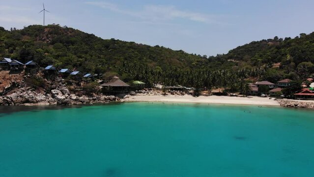 Pan over Aew Leuk Beach at Koh Tao in Thailand with Drone.