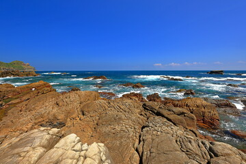 Fototapeta na wymiar Longdong Bay at Northeast coast of Taiwan (New Taipei City and Yilan) National Scenic Area.