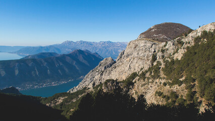 The Bay of Kotor, Beautiful aerial view of Boka Kotorska, with Kotor, Herceg Novi and Tivat municipalities in a sunny day, Adriatic sea and Dinaric Alps with Lovcen and Orjen mountains, Montenegro
