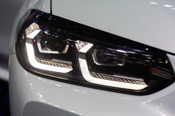 Fototapeta na wymiar Projector headlights are LED lights for new cars
