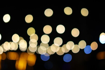 Golden bokeh background, glare of light in the form of circles