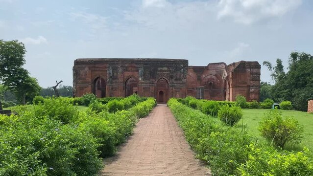 POV shot while walking through a path upto a fort wall built in Dhanbad,Jharkhand in India on a bright sunny day. Popular tourist destination.