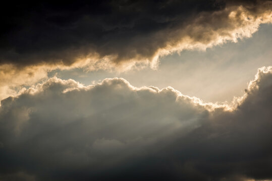 Sun beams or rays of light breaking through clouds, meditation background, beautiful conceptual beauty.