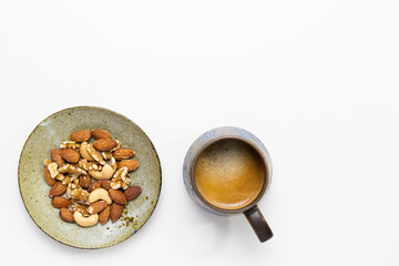 ミックスナッツとコーヒーの背景素材