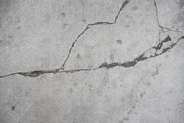 Obraz premium concrete wall background with long cracks