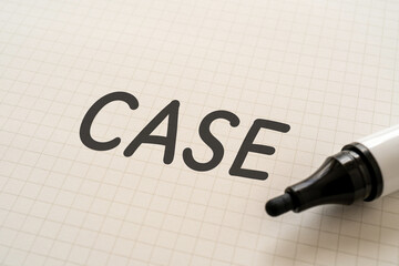 CASEと書かれたノートとマーカー
