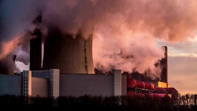 nuclear power plant Smokestacks of factory tubes chimney smoke create environmental pollutants Factory tubes chimney smoke