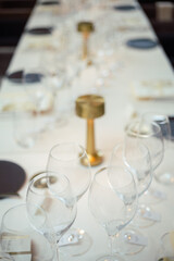 Empty wine glasses on event table settings