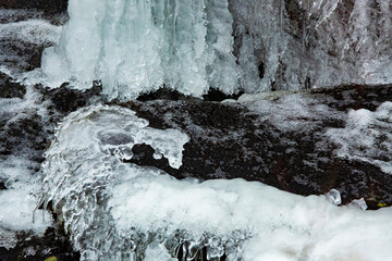 Dragon in icy waterfall at Goodwin State Forest in Connecticut.