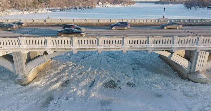 Reverse From Traffic On Ferry Street Bridge In Winter Champlin Minnesota - Drone