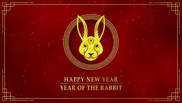 Motion graphic of Golden rabbit logo with chinese new year and year of the Rabbit 2023 on dark red background and glitter particle in a happy new year concept abstract background seamless loop video