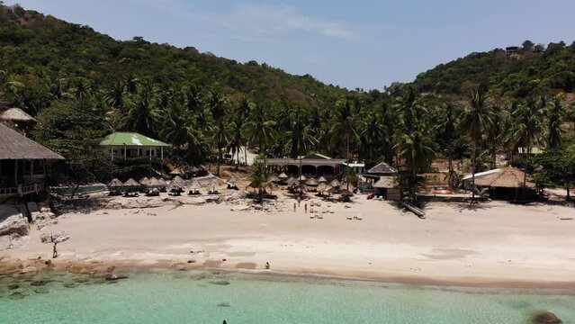 Beach girls at wonderful Aew Leuk Beach at Koh Tao in Thailand, filmed with a Drone.