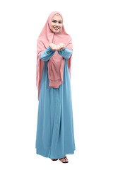 Asian Muslim woman in veil with open palm showing something
