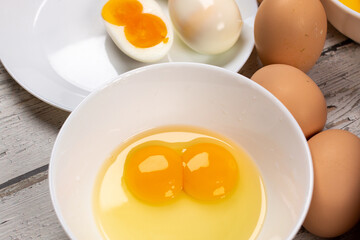 Double yolk eggs with jumbo size - obrazy, fototapety, plakaty