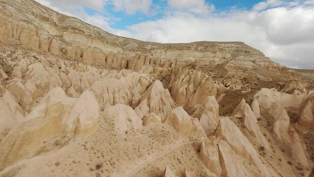 Flight Over Unusual Nature Landscape With Cone-Shaped Rock Formation In Cappadocia, Central Turkey. FPV