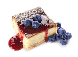 Piece of delicious cheese pie with blueberries and jam on white background