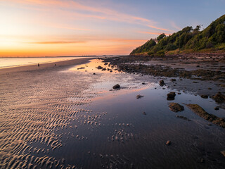 Seaside Sunrise with Cloud Reflections