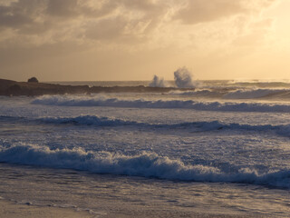 Coastal Sunrise with Waves Crashing