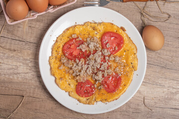 Tomato omelette with minced pork. Copy space.