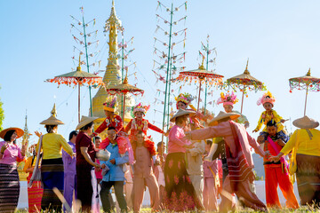 Group of Aisan people celebrate and enjoy with Thai northern tradditional activities in front of...