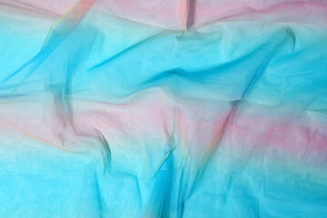 Silk fabric transparent. Blue pink red. twisted twirl fabric multicolour texture