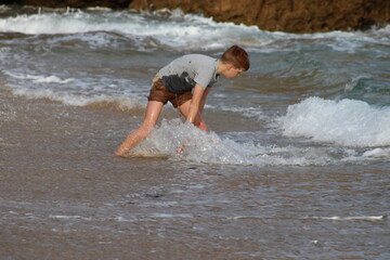 child playing in the water