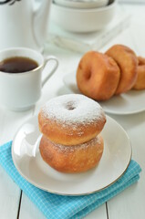 Sweet homemade donuts with sugar powder 