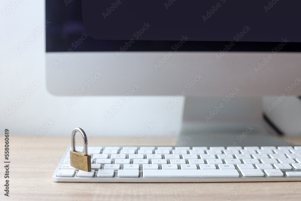 Poster lock on the computer keyboard on the desk. cyber security concept.