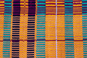 Close up shot of bright kente textile