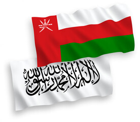 Naklejka premium National vector fabric wave flags of Sultanate of Oman and Islamic Emirate of Afghanistan isolated on white background. 1 to 2 proportion.