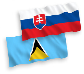 National vector fabric wave flags of Slovakia and Saint Lucia isolated on white background. 1 to 2 proportion.