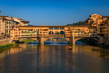 Naklejka premium Close up of silversmith shops on the famous Ponte Vecchio bridge on the Arno River in Centro Storico, Florence, Italy