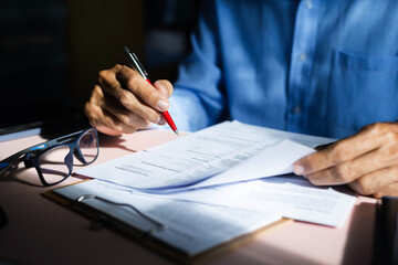Close-up view on desk office, businessman signing a contract of investment or insurance, legal...