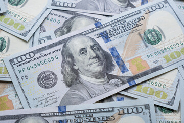 Texture of dollar bills. One hundred dollars. Close-up.