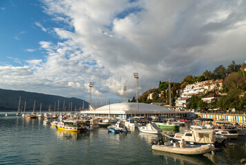 Fototapeta na wymiar Yachts in the marina at sunset - about December 2022, Herceg Novi, Montenegro