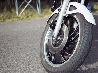Fototapeta na wymiar new motorcycle with metal parts and big wheels, bottom view